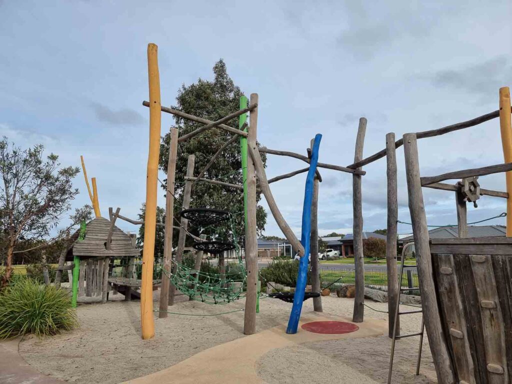 Climbing equipment between wooden posts warralily boulevard playground geelong