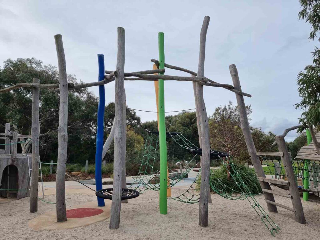 round swing and climbing rope ladders at warralily boulevard playground geelong